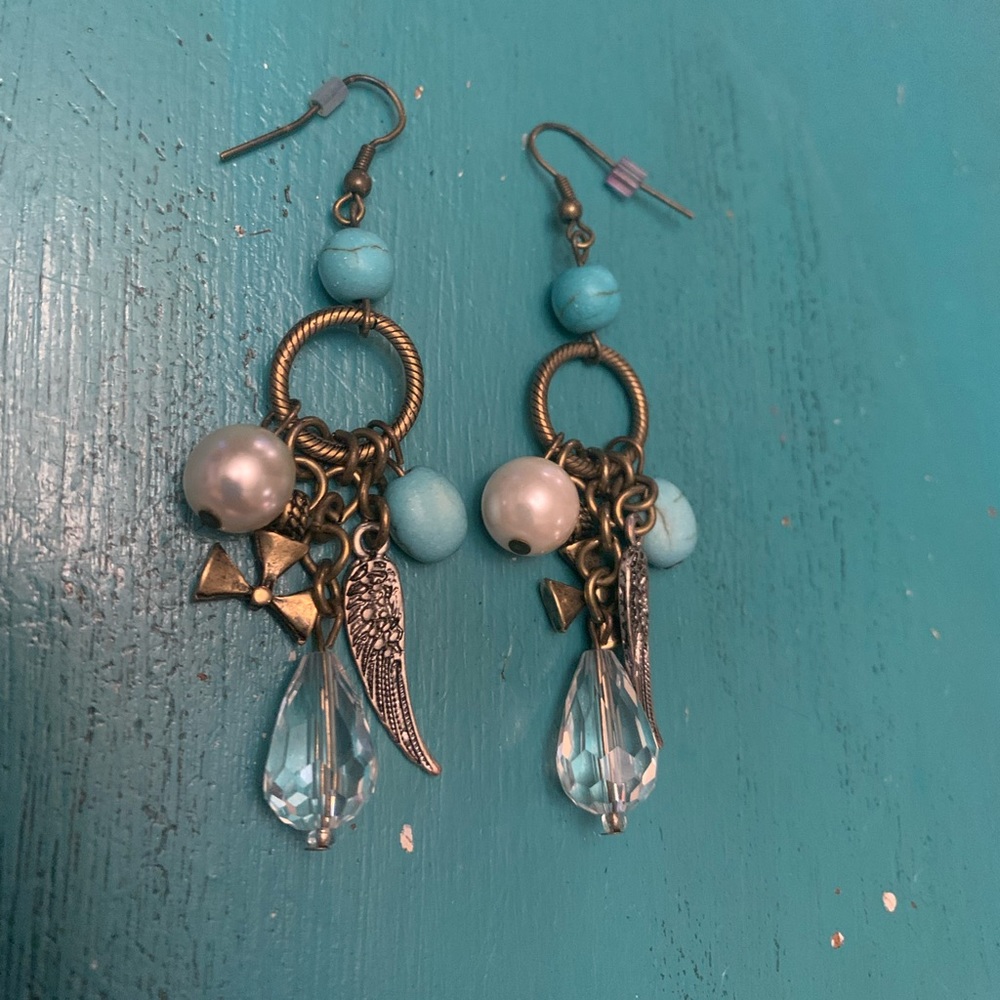 Turquoise and bronze earrings with multiple charms